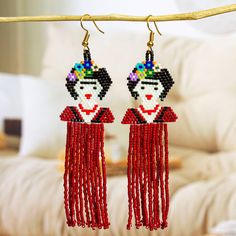 Artisan Angeles Gonzales pays tribute to iconic Mexican artist Frida Kahlo with these fun earrings. The earrings are handcrafted with tiny glass beads and swing from 14k gold-plated steel hooks. Mexico Gift, Waterfall Earrings, Long Beaded Earrings, Forever Products, Gift Suggestions, Mexican Artists, Buy Bead, Free Gift Wrapping, Fun Earrings