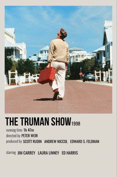 the truman show poster with a man walking down the street carrying luggage in his hand