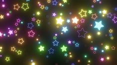 multicolored stars are scattered on a black background