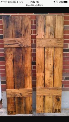 two wooden doors sitting next to each other