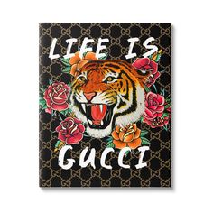 a tiger with roses on it and the words life is gucci