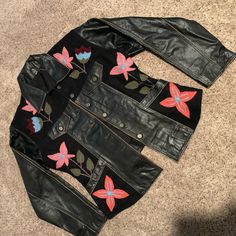 Hi! This Is A Very High Quality, Italian Leather Boutique Jacket. It Has Gorgeous Floral Embroidery On The Front And Back. Button Front Closure, Front Hip Pockets, Front Of Jacket Slightly Higher Than Rear. Distressed Edges On Front And Back, As Well As Sleeves. Jacket Is Noted As Size Large, But Wears More Like A Medium. I Am A Size 8 With A C Cup Bra. Measurements Are Included In The Photographs. Please Note There Is A Very Small Distressed Mark On One Of The Sleeves. This Is Pictured Item Is From A Smoke And Pet Free Home. Bra Measurements, C Cup, Cup Bra, Embroidered Jacket, Bra Cups, Italian Leather, Floral Embroidery, Jackets & Coats, Jackets For Women