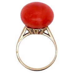 A very fine vintage gold and coral ring. With a rich salmon or almost red coral button cabochon set in 14k yellow gold setting. Marked to the shank 14k for gold fineness. Ring Size: ca. 5 1/2 Height: ca. 31 mm Width: ca. 18 mm Items purchased from this dealer must delight you. Purchases may be returned for any reason for a period of 7 days. Coral Ring, Coral Jewelry, Yellow Gold Setting, Red Coral, Cocktail Ring, Turquoise Jewelry, Cocktail Rings, Vintage Gold, Diamond Jewelry