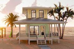 a house sitting on top of a sandy beach next to the ocean with palm trees