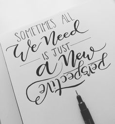 someones all we need is just a new approach handwritten quote on white paper