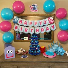 a birthday party with balloons and decorations