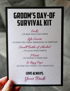 a person holding up a card that says groom's day - of survival kit