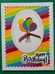 a colorful birthday card with balloons on it