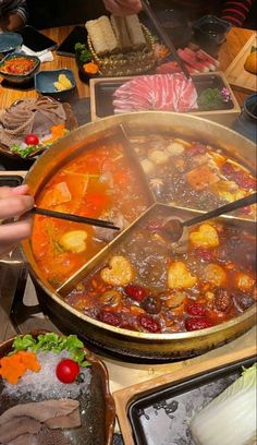 a large pan filled with food on top of a table