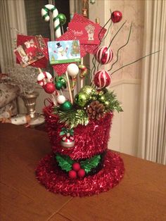 a candy cane christmas centerpiece on a table