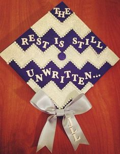 a decorated graduation cap with the words rest is still unwritten