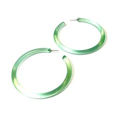 Spring green hoop earrings in a great bold size & a transparent see-through finish. The Bangle Hoop Earring is one of our larger styles. Because they are made with vintage lucite parts, they are super light weight even though they're big & bold. Hoops measure approximately 3" or 77mm in diameter. Earrings are made with vintage lucite parts that were made in the US in the 1960's - early 80's. We hand-set them with surgical steel earring posts and they have sturdy surgical steel/acrylic backings o Modern Plastic Hoop Earrings, Modern Plastic Hoop Jewelry, Trendy Plastic Hoop Earrings, Modern Lucite Hoop Earrings, Green Hoop Earrings, Surgical Steel Earrings, Earring Posts, Vintage Lucite, Spring Green