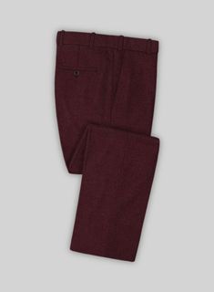 The darker shade of Dark Wine Heavy Tweed pants will bring out a perfect balance between playfulness and sincerity. Crafted from wool, the tweed pants are an ideal choice to make a sharp formal appearance at any event. Tag it with a matching jacket and waistcoat, a white shirt and black dress shoes. 
 
Look Includes   Dark Wine Heavy Tweed Fabric  Cross Pocket  Flat Front  Two Welted Back Pockets on Trousers    Click 'Customize Now' to modify the look if needed.  
 
Lining: Viscose; Dry Clean. Formal Tweed Pants For Fall, Elegant Tweed Pants For Winter, Fitted Tweed Pants For Fall, Fall Fitted Tweed Pants, Formal Tweed Pants With Herringbone Pattern, Tailored Tweed Pants For Formal Occasions, Formal Wool Pants For Fall, Formal Burgundy Bottoms For Fall, Formal Fitted Bottoms With Herringbone Pattern