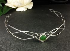 I have fabricated a sterling silver headpiece which is designed to be worn by either gender, either for a wedding, a Renaissance event, or hand-fasting ceremony. A unisex circlet with a Middle Earth feel! This piece will fit 3/4's around the head and is tied off, in the back, by an elastic jeweler's cord so that it will remain snug and in place while in motion. This works better than using a chain link, which can leave a circlet too tight or just slightly too loose. This way, you tie it off to f Handmade Teardrop Crown Headpiece For Weddings, Handmade Teardrop Crown Jewelry For Wedding, Handmade Silver Headpieces For Ceremonial Occasions, Handmade Silver Headband, Elegant Silver Headpieces For Gifts, Adjustable Silver Crown Headpiece, Adjustable Silver Crown Headband, Handmade Wedding Jewelry Headband, Handmade Silver Headband Jewelry