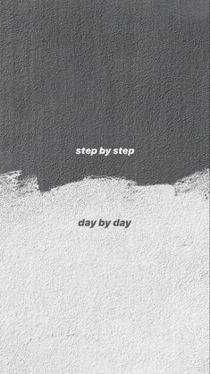 a black and white photo with the words stop by step written on it