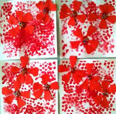 four red flowers on white paper with polka dots