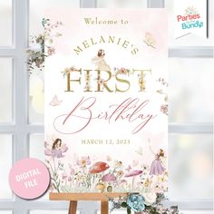 a baby shower sign sitting on top of a easel