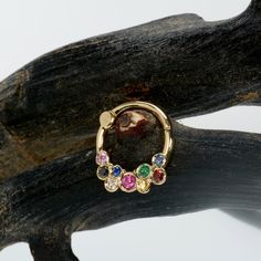 Septum clicker Natural Stone: White diamond - Black diamonds Emerald - Ruby - pink sapphire - blue sapphire - Garnet Inner diameter 6mm, 7mm, 8mm, 10mm septum ring 18g, 16g, 14g Materials: 14k Solid gold yellow gold, rose gold , white gold Gold Hoop Jewelry With Gemstone Accents, Gold Hoop Earrings With Gemstone Accents, Gold Multi-stone Hoop Earrings As A Gift, Rainbow Septum, Gold Multi-stone Hoop Earrings, Yellow Gold Multi-stone Hoop Earrings, Yellow Gold Multi-stone Hoop Earrings Fine Jewelry, Multicolor Multi-stone Hoop Jewelry, Daith Ring