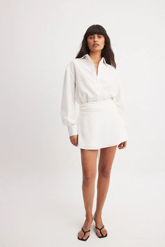 Open Tie Back Shirt Dress White Collared Mini Dress For Office, Elegant Mini Length Shirt Dress For Brunch, White Mini Length Shirt Dress For Date Night, Classic Mini Length Shirt Dress For Day Out, Elegant Mini-length Shirt Dress For Brunch, Classic Mini Shirt Dress For Office, White Mini Shirt Dress For Date Night, Classic Mini Dress For Day Out, Elegant Button-up Mini Dress For Brunch