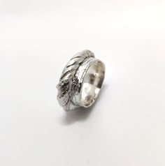 One of a kind ring made by using Japanese mitsuro hikime casting technique.  This technique creates very organic, rustic and unique fluid-like pattern on the ring. The material is hallmarked sterling silver. NOTE, measurements vary due to the organic shape of the ring. The ring can be stretched 1-2 sizes if required, but cannot be made smaller, as the unique pattern would get damaged. Diameter approximately 17 mm,  width 7mm-11mm,  thickness 4mm-6mm Size chart: Ireland/UK/AU/NZ: O 1/2 - P Europe Mitsuro Hikime, Organic Shapes, Silver Band, Rings Statement, Unique Patterns, Sterling Silver Ring, Favorite Jewelry, Statement Rings, Silver Ring