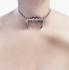 Vampire Bite Choker 🖤 This choker is the perfect way to add a touch of darkness to your look. The rhodium plated chain is durable and tarnish-resistant, while the large silver vampire teeth charm is a statement piece that will turn heads. 🖤 Only one available as I like to make one of a kind pieces so that you have a unique, standout, rare, special piece that you can't find anywhere else. Keep your jewellery away from water, oils, perfumes and make sure to remove before showering and sleeping i Vampire Bite, A Touch Of Darkness, Touch Of Darkness, Vampire Bites, Tooth Charm, Vampire Teeth, Christmas Deals, Choker Necklaces, Rhodium Plated