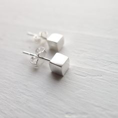 Cube Stud Earrings Posts Silver Cube Earrings Tiny Stud Earring Square Post Earings Minimalist Jewel Modern Tiny Earrings For Gift, Tiny Modern Earrings For Gift, Tiny Minimalist Sterling Silver Earrings, Silver Dainty Earrings Simple Design, Dainty Silver Earrings With Simple Design, Simple Sterling Silver Earrings As Gift, Sterling Silver Simple Design Earrings For Gift, Minimalist Silver Hypoallergenic Earrings, Minimalist Nickel-free White Gold Earrings