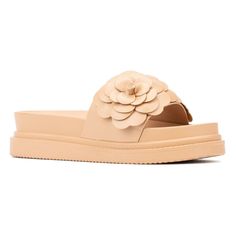 These slides feature a unique appeal with eye-catching flower appliqué that adds a touch of charm to your look. Not only are they visually striking, but they are also designed with comfort in mind, making them perfect for walking. The soft, cushioned sole ensures all-day wearability, while the floral details offer a playful and stylish twist. Whether you're heading to the beach or a casual outing, these slides blend fashion and function effortlessly. Beige Slide Slippers For Spring, Trendy Beige Slippers For Spring, Olivia Miller, Faux Leather Heels, Jelly Sandals, Open Toe Shoes, Flower Applique, Slide Sandals, Leather Heels