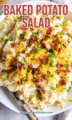 this baked potato salad is loaded with bacon, cheese and green onions it's ready to be eaten