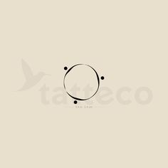 a circle with dots in the middle on a beige background that says tattoeco