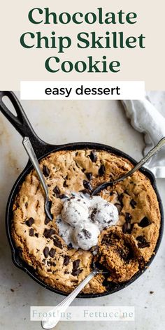 chocolate chip skillet cookie in a cast iron skillet with ice cream on top