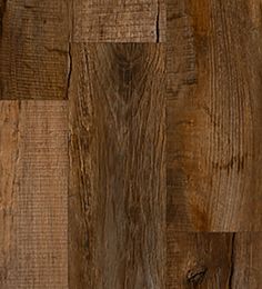 wood flooring that looks like it has been made from different types of boards and planks