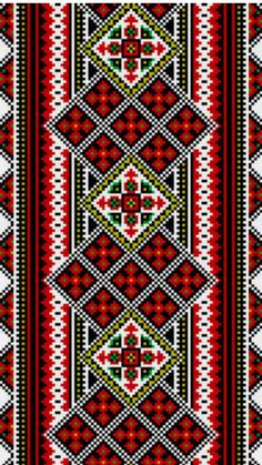 a red, white and green pattern on fabric