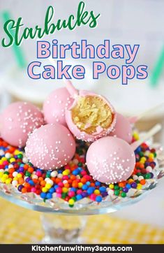 some pink cake pops with sprinkles on top and the words starbuck's birthday cake pops