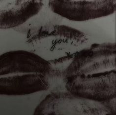 a close up of a plate with some writing on it's surface and lips