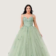 This Gorgeous Layered Tulle Quinceanera Ball Gown Is A Perfect Choice For Making Your Special Day Extra Memorable. Butterfly Appliques Adorn The Straps Of This Ball Gown, Creating A Beautiful Statement. The Look Is Enhanced Even Further By Layers Of Tulle With Slightly Scattered Butterfly Appliques Fabric: Tulle Length: Long Color: Sage Neckline: Sweetheart Silhouette: Ball Gown Sleeve: Sleeveless, Straps Skirt: Layered Embellishments: Butterfly Applique Occasion: Romantic Date/Evening/Dinner, W Elegant Embroidered Quinceanera Gown, Quinceanera Dresses With Intricate Embroidery And Fitted Bodice, Quinceanera Ball Gown With Intricate Embroidery, Quinceanera Embroidered Ball Gown, Embroidered Ball Gown With Fitted Bodice For Quinceanera, Floor-length Gown With Intricate Embroidery For Quinceanera, Embroidered Floor-length Ball Gown For Quinceanera, Embroidered Floor-length Gown For Quinceanera, Quinceanera Ball Gown With Floral Embroidery And Fitted Bodice