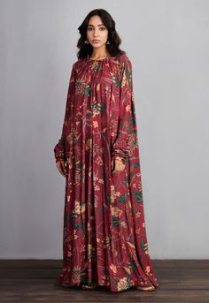 Editor's Note Featuring Garnet Red Sanobar Amrut Maxi Dress Color: Garnet Red Fabric: 100% Cotton Silk Component: Dress Care: Dry Clean Only    About the Designer Torani by Karan Torani stands ... Printed Maxi Dress Indian, Long Blue Maxi Dress, Outfit Patterns, Silk Printed Dress, Hijab Design, Modest Dressing, Indian Mythology, Fashion Dresses Formal, Maxi Dress Designs