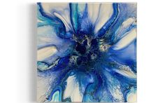 a blue and white abstract painting on canvas