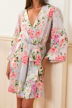 This elegant floral robe showcases an exclusive, romantic print on luxuriously soft, high-quality rayon. Meticulously designed for versatile wear, it’s the perfect addition to any woman's wardrobe. Whether used as a bridesmaid or bridal robe, a maternity robe, or as a stylish pool or beach cover-up, this robe is a one-of-a-kind keepsake. FABRIC: 100% Rayon LENGTH: Top of shoulder to hem 36" STYLE: PJ-18088 in SOFT KISS BLUE - SOBLU-P99 *Model is wearing size small *Machine was on cold, and hang Bridesmaid Robes Floral, Lounge Looks, Dream Lover, Floral Bridesmaid, Bridal Robe, Yumi Kim, Floral Robes, Daytime Dresses, Bridesmaid Robes