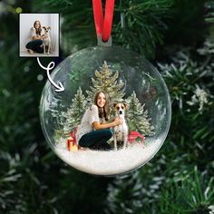 a christmas ornament with a woman and her dog