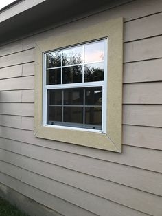 a window on the side of a house