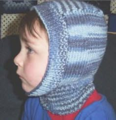 a young child wearing a knitted hat