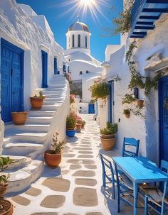 an alleyway with blue doors and steps leading to a white church in the background