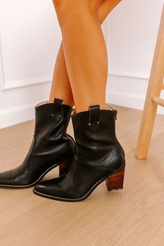 - This faux leather boot runs more true to size - Heel Height: 3 1/4 inches - Opening Width: 11 inches