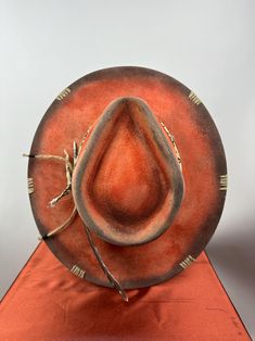 Orange Distressed Road Warrior - Etsy Rustic Adjustable Felt Hat With Short Brim, Rustic Adjustable Short Brim Hat, Rustic Adjustable Brimmed Top Hat, Rustic Curved Brim Hat For Kentucky Derby, Rustic Top Hat With Adjustable Flat Brim, Rustic Kentucky Derby Hat With Curved Brim, Adjustable Rustic Fedora Hat, Rustic Adjustable Hat With Curved Brim, Rustic Top Hat With Curved Brim For Rodeo