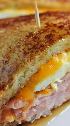 a grilled ham and cheese sandwich on a plate