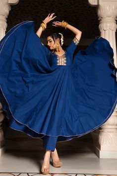 One of our timeless classics, hand-stitched exclusively for your bespoke taste. Channel your desi diva vibes and experience luxury in our all-time favorite festive collection comprising a blue Cotton anarkali with Cotton Pants and soft net Dupatta. Crafted in premium quality Cotton fabric, the blue cotton anarkali comes lace work over neck, sleeves and bottom of anarkali as well as dupatta. PRODUCT DESCRIPTION: Kurta & Pant: Cotton Dupatta: Soft Net Color: Blue No. Of Components : Set of 3 Embro Pomcha Jaipur, Kathak Costume, Navy Blue Anarkali, Cotton Anarkali Suits, Desi Things, Anarkali Suits Designer, Silk Anarkali Suits, Blue Dupatta, Blue Anarkali