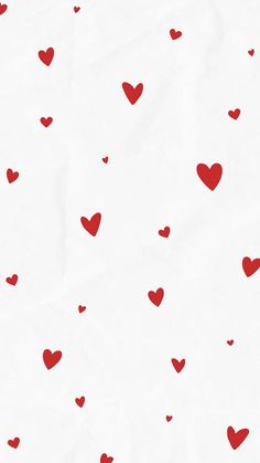 red hearts are flying in the air on white paper