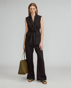 The Tencel™ Sleeveless Blazer Black – Everlane Black Notch Lapel Vest For Fall, Modern Sleeveless Outerwear For Work, Modern Sleeveless Vest For Formal Occasions, Black Vest For Business Casual In Spring, Modern Black Vest For Workwear, Black Vest For Business Casual Spring, Modern Black Vest For Work, Tailored Sleeveless Blazer For Fall, Business Vest For Fall, Sleeveless