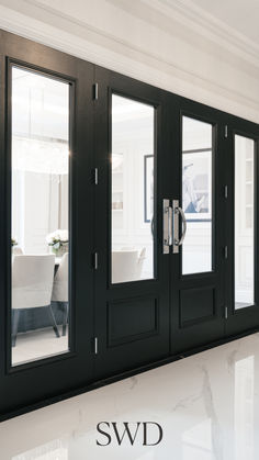 Enhance your interiors with these luxurious black glass panel double doors, designed to combine modern elegance with timeless craftsmanship. Featuring sleek chrome handles and large glass panels, these doors allow natural light to flow while providing privacy and style. Ideal for dining rooms, home offices, or living spaces, they create an open and airy feel while adding a bold and sophisticated statement. Elevate your home with this bespoke design crafted for beauty and functionality

#swdbespoke
#bespokedoors
#luxurydoors
#highglossdoors
#oakdoors
#bespokeoakdoors
#luxuryoakdoors
#oakstaineddoors
#internaldoors
#interiordoors
#bespokedoorsuk
#bespokedoorsdubai
#uniquedoors
#luxurydoorsusa
#luxurydoorsdubai