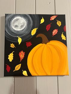 an acrylic painting of a pumpkin with fall leaves on it and a full moon in the background